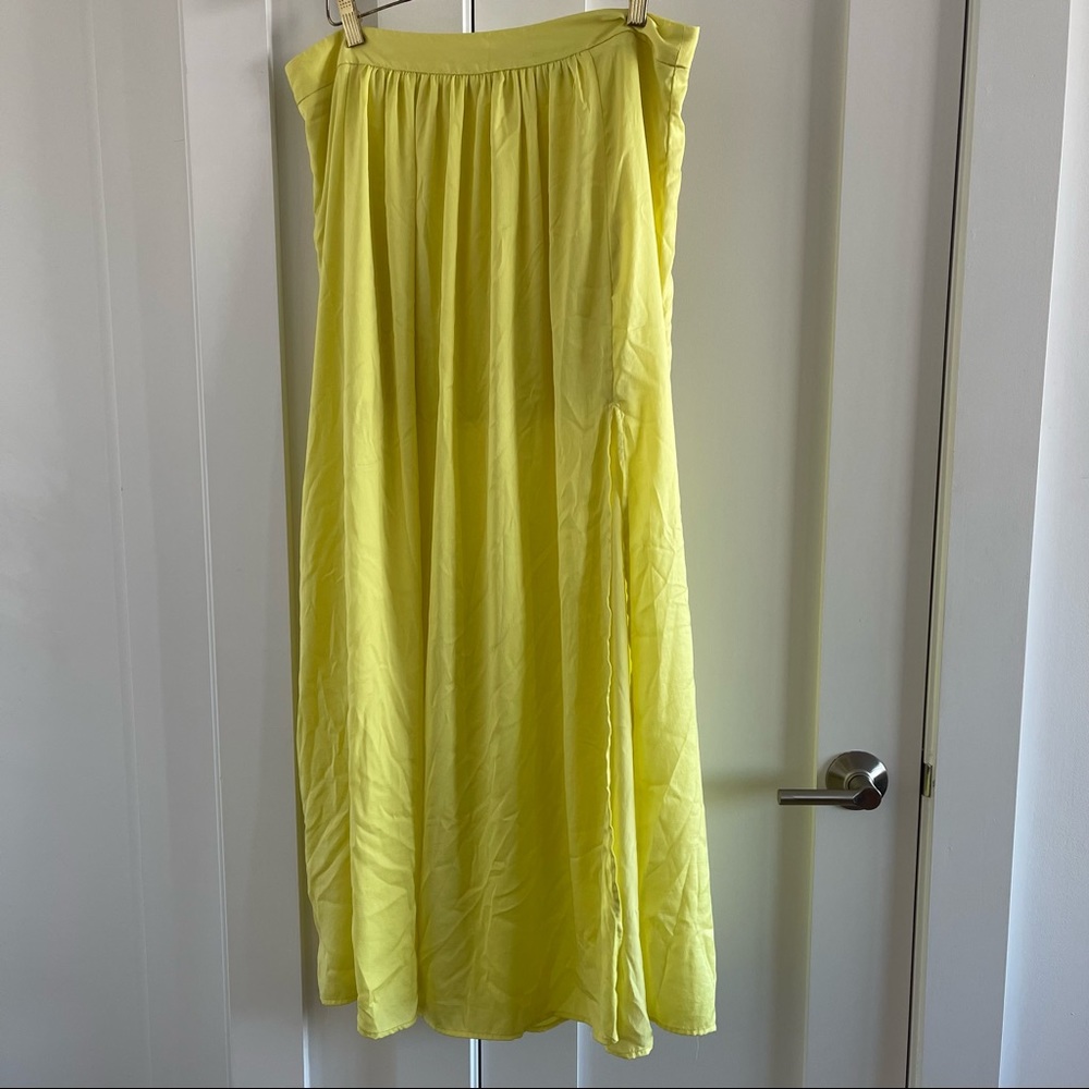 Yellow maxi skirt with slit and mini skirt lining